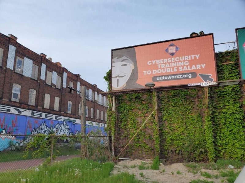 A billboard in Detroit advertises Automation Workz's cybersecurity bootcamp.