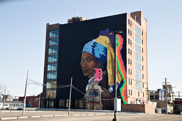 Muralist Sydney James created 'Girl with the D Earring' on the Chroma building last year, a 107-year-old former storage building in Detroit's Milwaukee Junction.