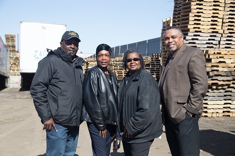 Siblings J.D. Givhan, Rebecca Givhan, Geraldine Wooten, and business manager Les Lance are proud of the premises they have built for J&G Pallets at a renovated site on Mack Avenue.