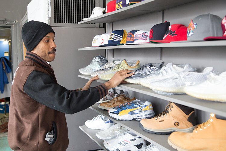 Jason Johnson carefully selects what he stocks in Midtown's Bob's Classic Kicks.