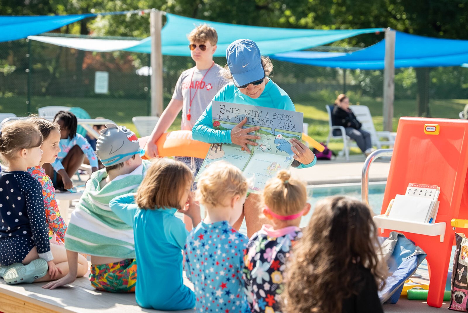 Kids participate in an Everyone in the Pool swimming lesson.