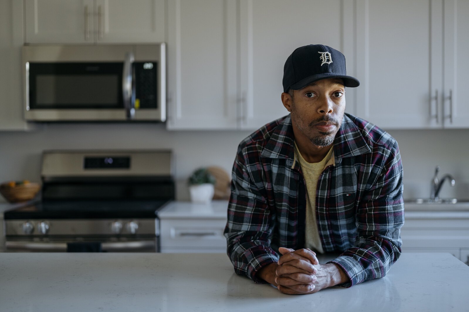 Edward Carrington in the kitchen of an apartment at The Ribbon.