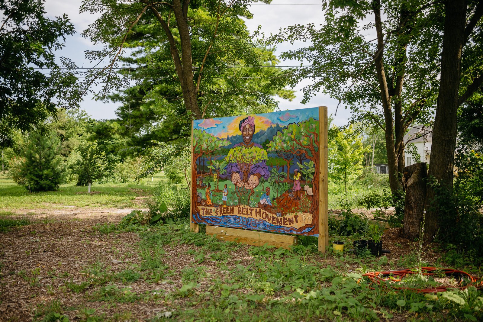 A mural of Kenyan activist Wangari Maathai at Arboretum Detroit's tree nursery. Maathai founded the Greenbelt Movement, which advocates for conservation and women's rights.