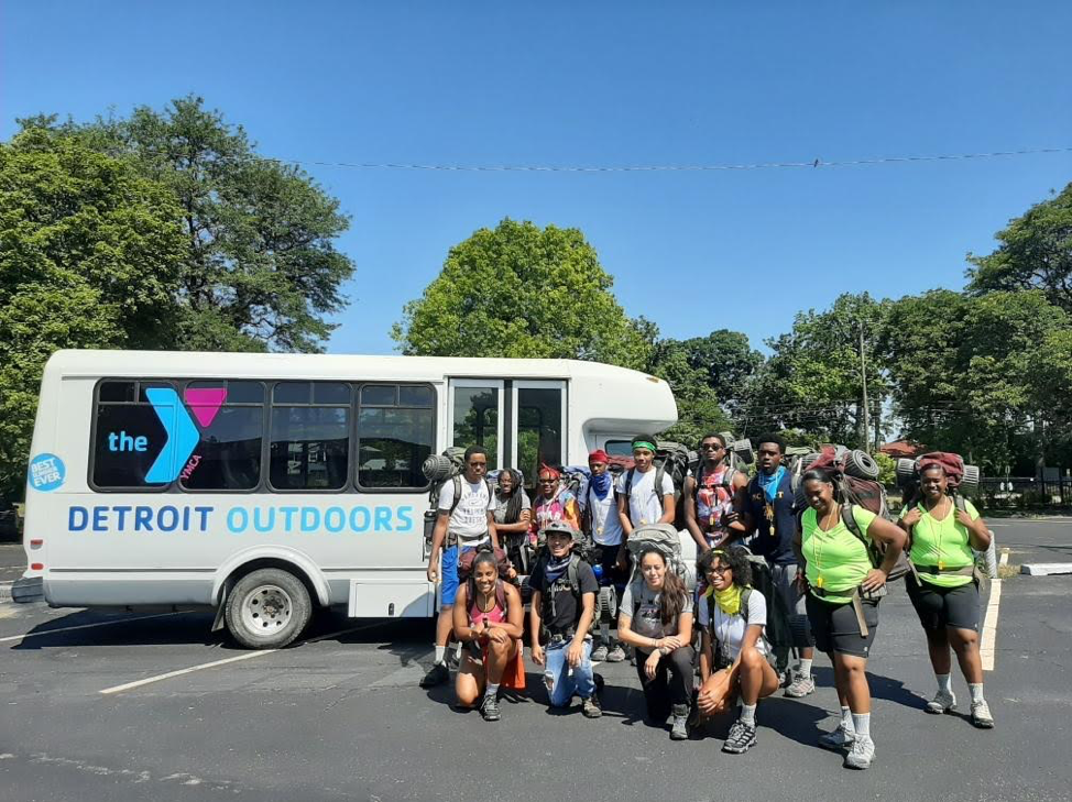 A YMCA Bold and Gold crew ready to load up for a backpacking adventure.