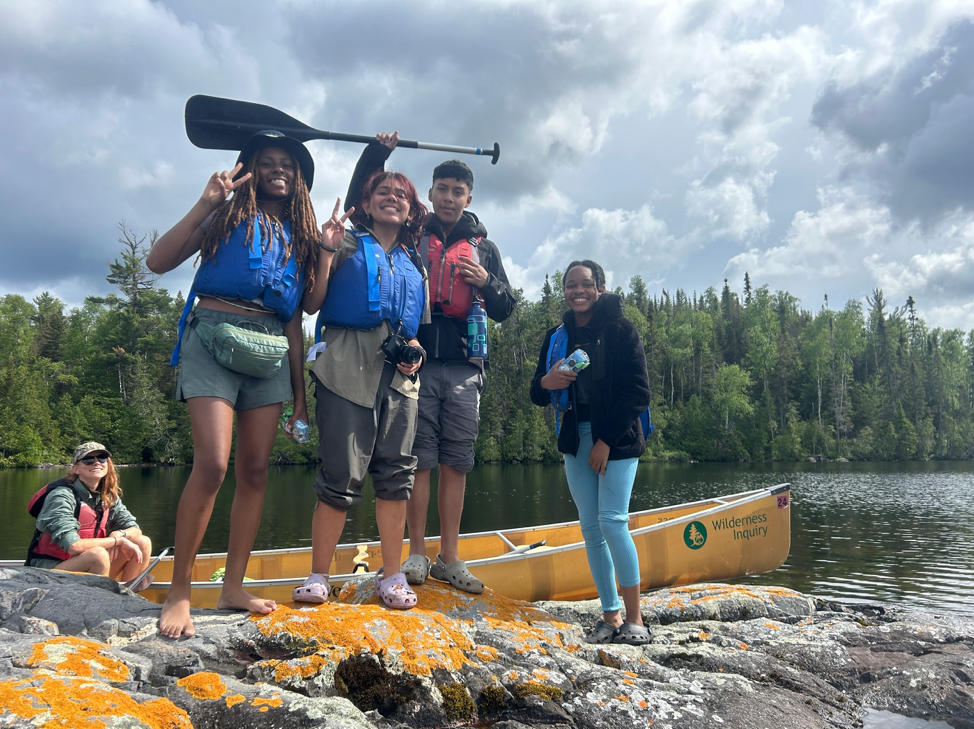 Detroit Outdoors staffer Jac Kyle with students Naja Flemings, Mads Martinez, Adrian Gutierrez, and Alana Murrie on a Detroit Outdoors trip to Brule Lake in Minnesota.