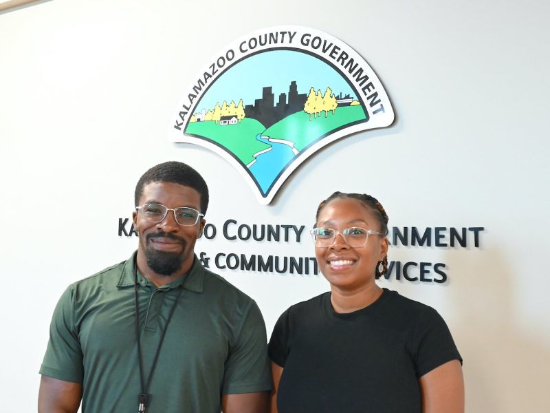 Derek Miller, program supervisor for Kalamazoo County’s Healty Babies Healthy Start & 4Dad Fatherhood Program, with Sidni Miller, community health worker, inside Kalamazoo County’s Health and Community Services building.