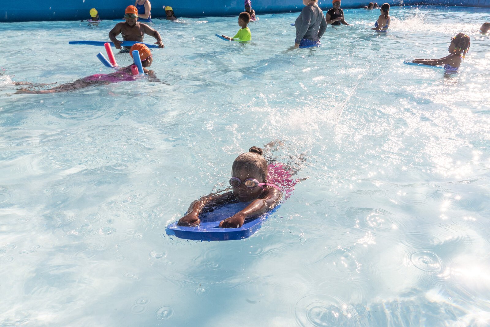 An Everyone in the Pool swimming lesson.