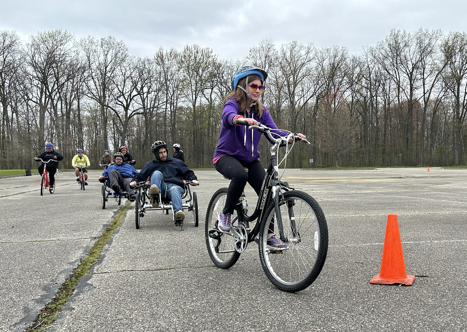 Cyclists practice in a parking lot at Willow Metropark before hitting the trail.