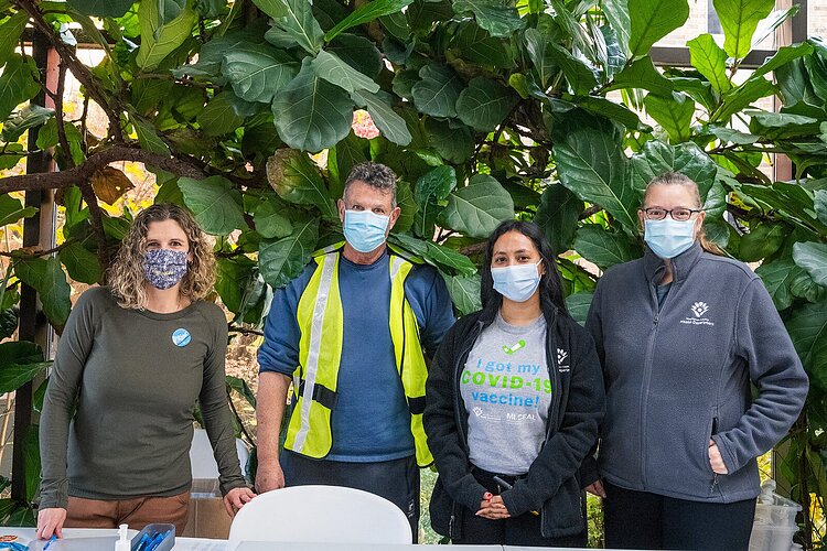 Kerri Hudson, David White, Lupe Cervantes, and Susan Ringler-Cerniglia at a 2021 Washtenaw County Health Department vaccine clinic.