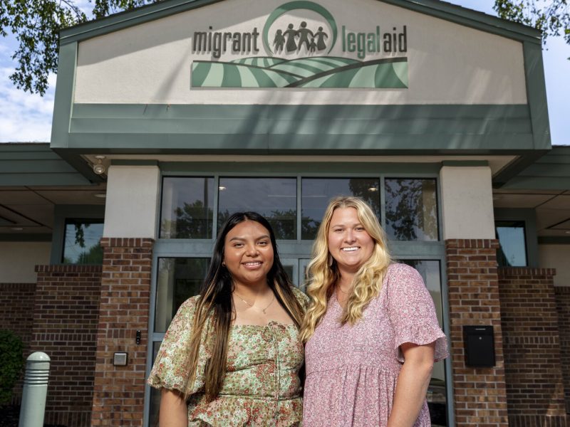 College student and former migrant worker Dilayla Martinez with Migrant Legal Aid attorney Molly Spaak.