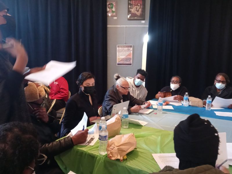 Citizen action team members in the Citizenship for Health program discuss their mission and vision for community issues they want to take action on.