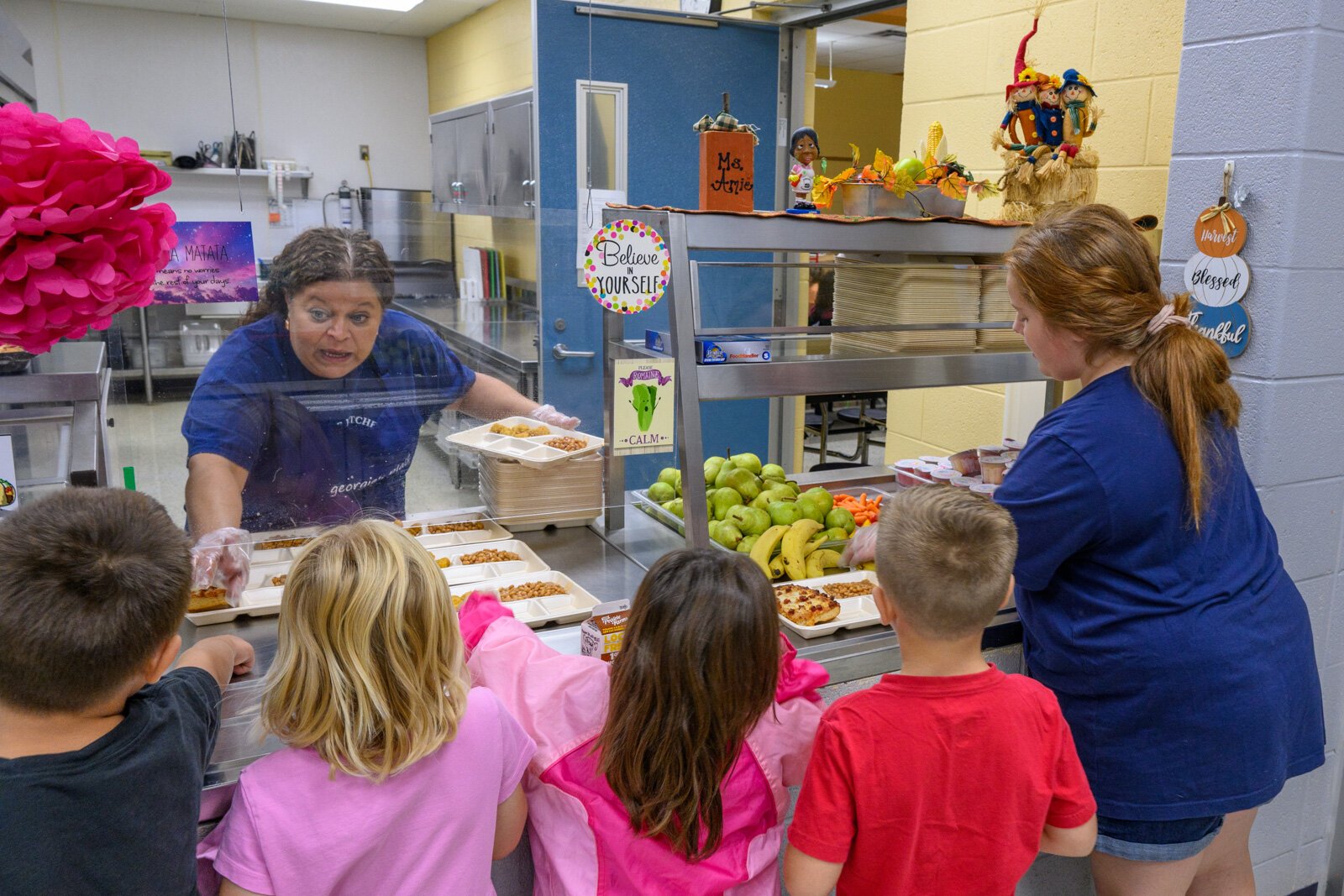 Students at Grass Lake's George Long Elementary wait for lunch.