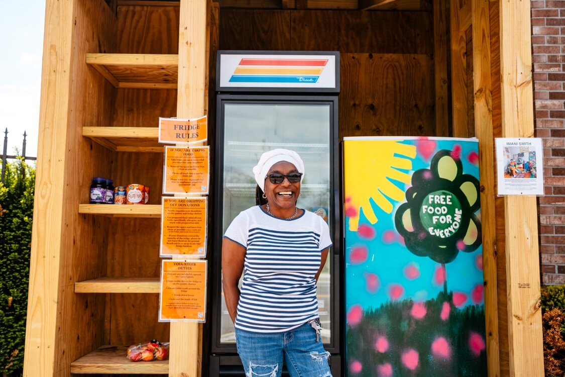 Belinda Gilmore stands in front of the Community Fridge on Kercheval.