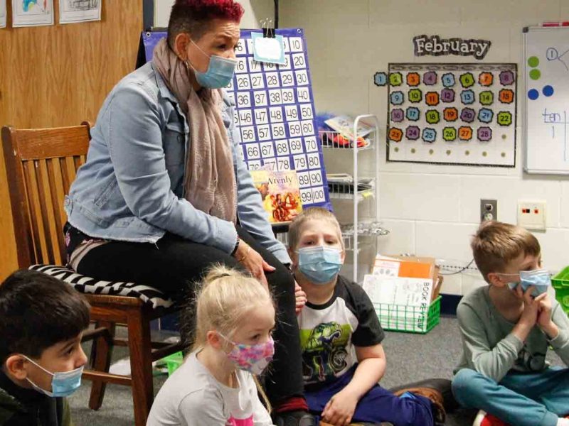Behavior Specialist Mary Carter asks students at Kalamazoo's Northwood Elementary to discuss their feelings.