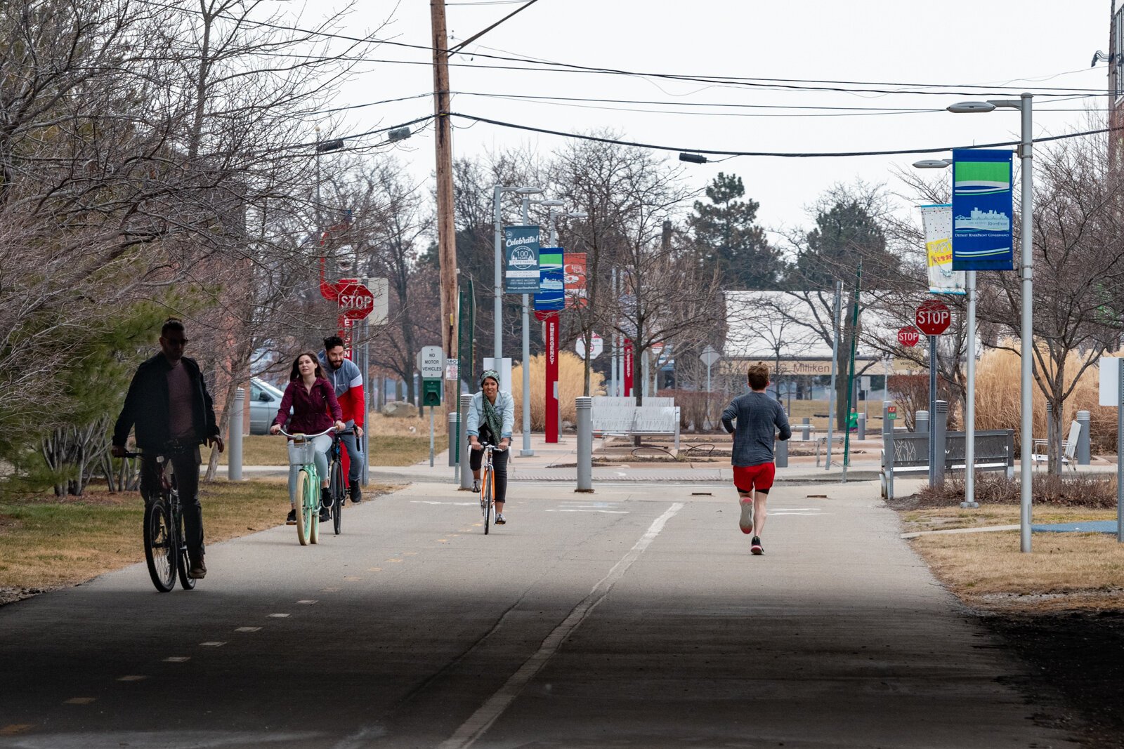 People walking and biking along the Dequindre Cut in Detroit.