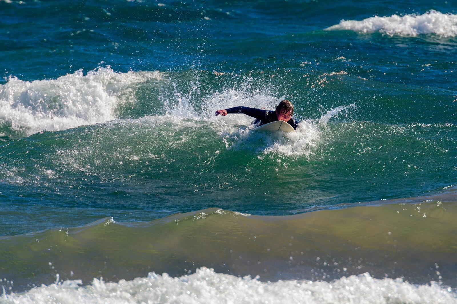 Surfing on Bete Grise. Photo by Doug Coombe.