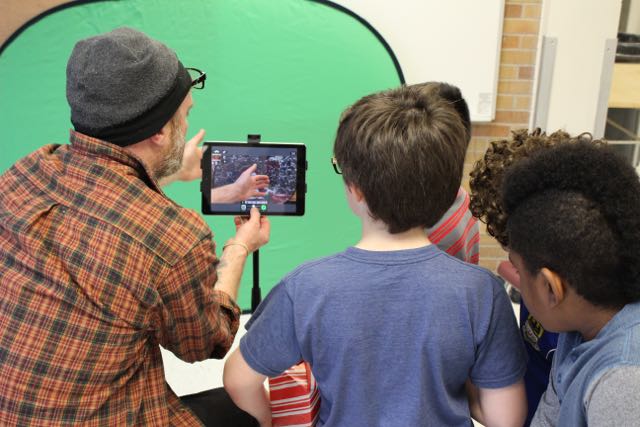 Filmmaker Mikey Brown demonstrates using a handheld camera