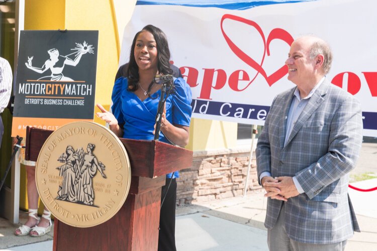 Sheri Williams, founder of Agape Love Child Care Center, and Mayor Mike Duggan.