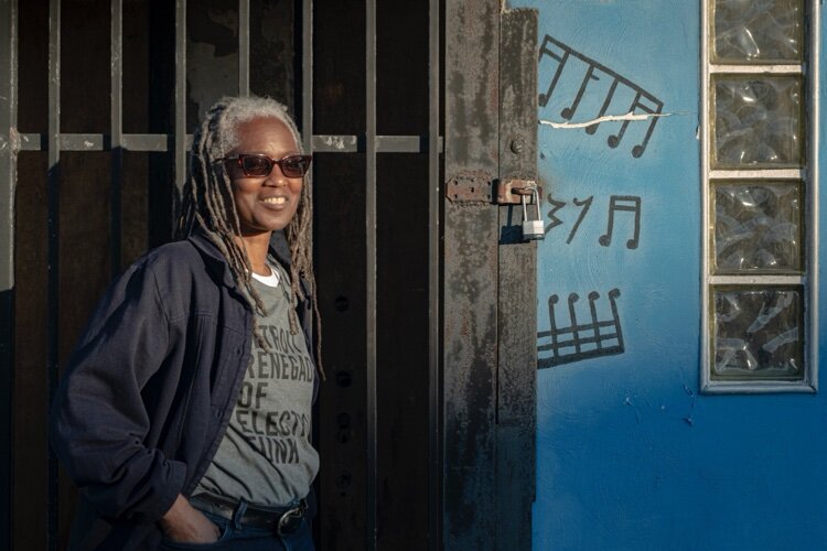 Michelle Jahra McKinney, Executive Director of the DSC, in front of the Blue Bird Inn. (Courtesy of Detroit Sound Conservancy / Photo: Iian Tarver)