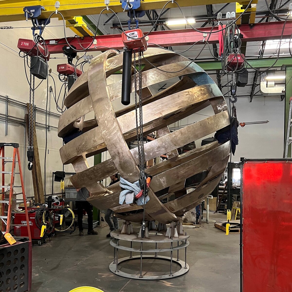 Hocking’s spherical “Floating Citadel” is 11 ft. in diameter and made from bronze.