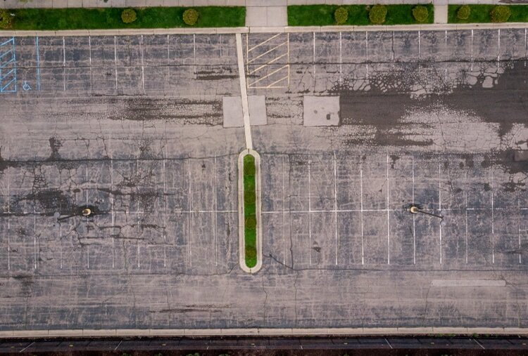 The Sacred Heart parking lot before the project began