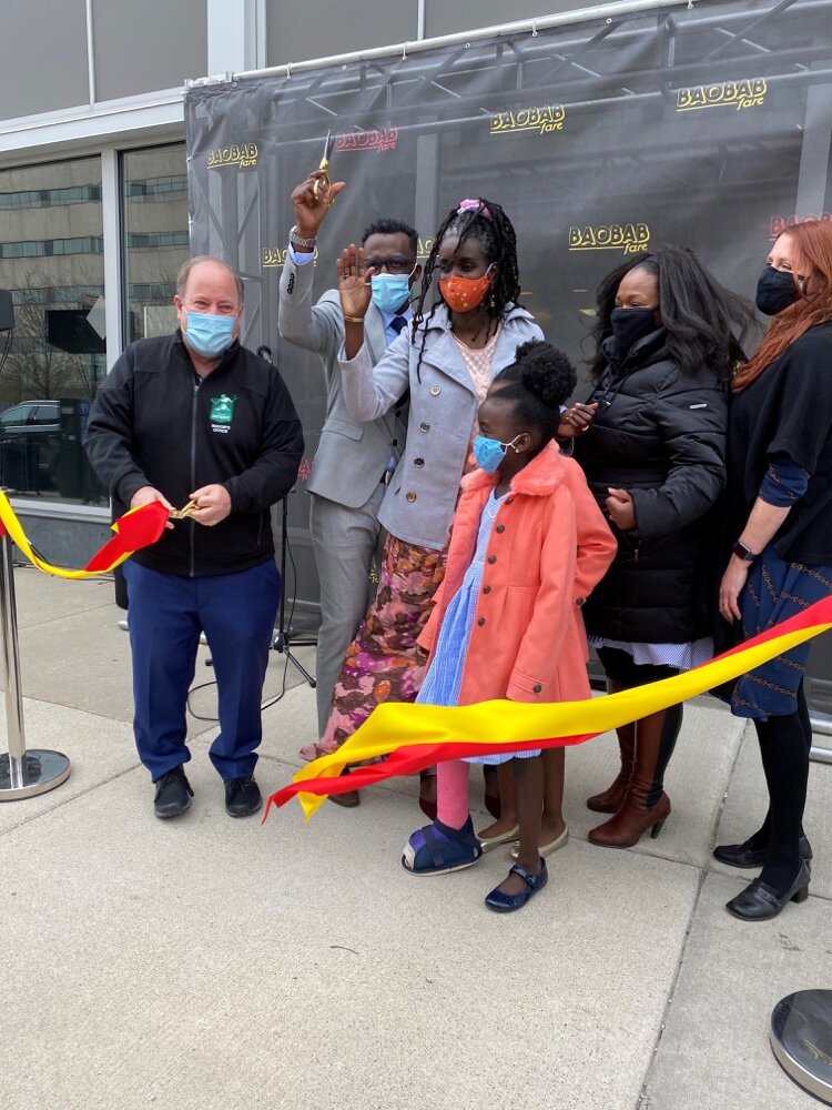 “I am thrilled to welcome Detroit’s first East African restaurant, Baobab Fare to New Center,” says Mayor Mike Duggan, left.