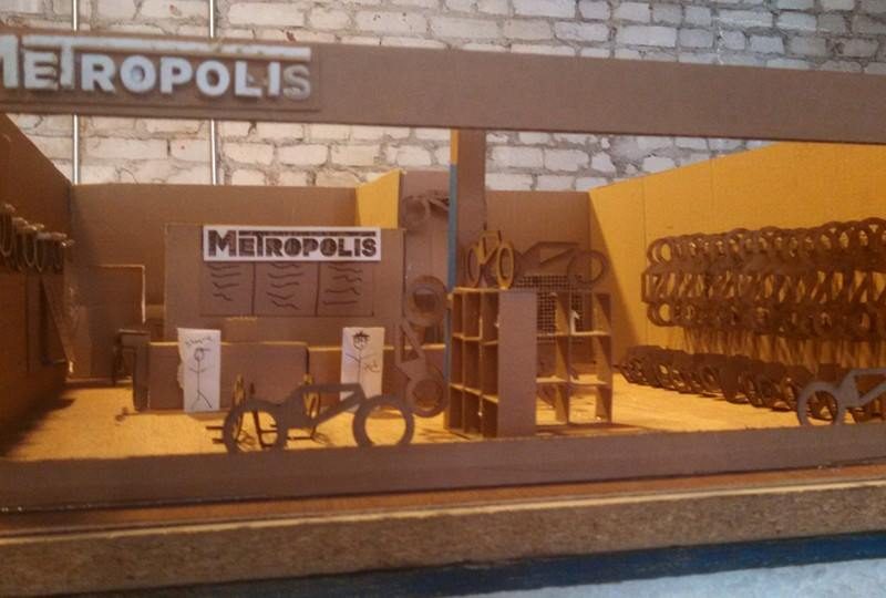 A cardboard model of the Metropolis storefront