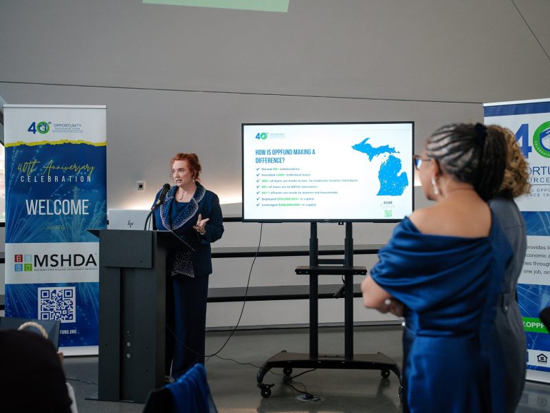 Former President and CEO Christi Coady Narayanan speaks at one of Opp Fund's anniversary events. Courtesy photo.