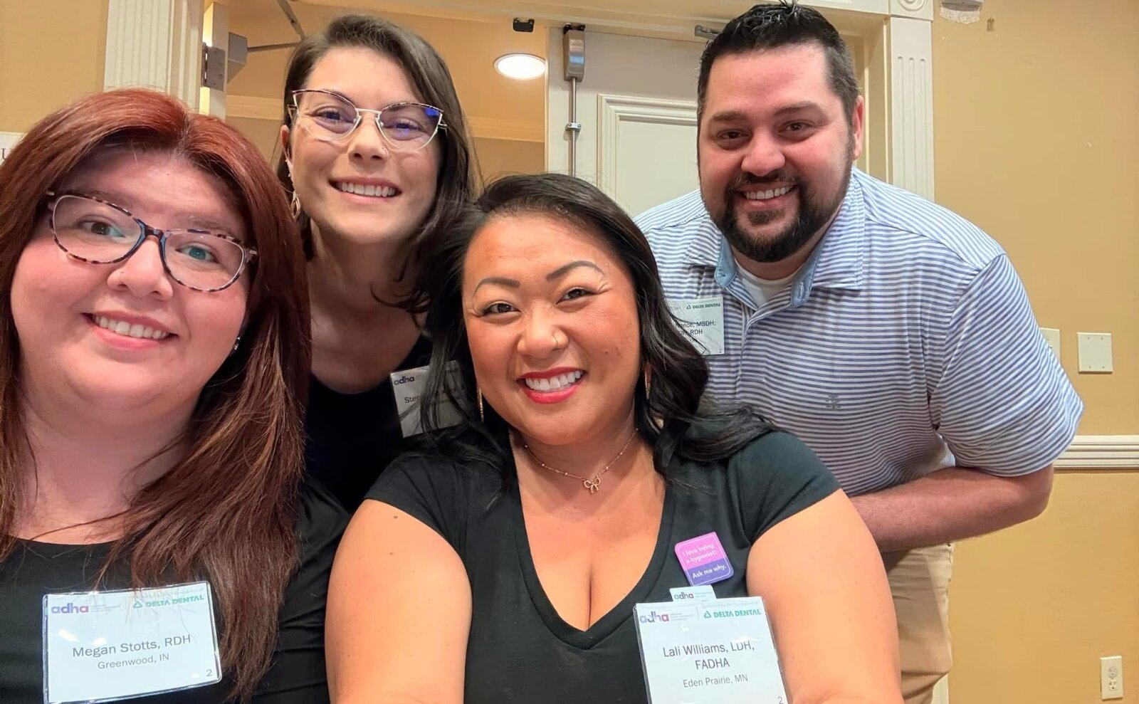 Justin Nance alongside fellow dental hygienists.