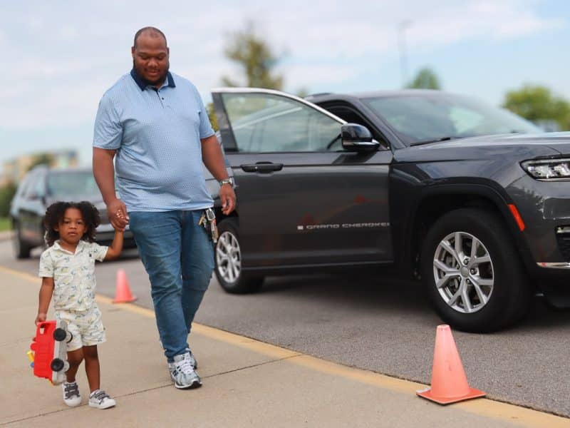 Matthew Verley drops off his son Lil' Matt at child care.